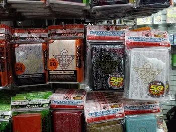 100 iepakojumi/loti (5000 gab.), Yu-Gi-Oh! Cosplay Yugioh Tūkstošgades Mīklu Anime, Galda Spēles, Kartes Piedurknēm Kartes Barjeru Kartes Aizsargs