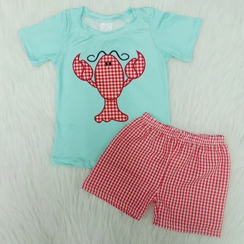 Karstā pārdot toddler zēnu drēbes omārs iespiesti īsām piedurknēm reglāns t-krekls un seersuckers šorti matching meiteņu apģērbs