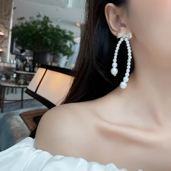 Korejiešu jaunā dizaina modes rotaslietas pārspīlēti garu, baltu pērļu kokvilnas loku kristāla temperaments sieviešu auskari