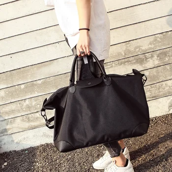 Soma sieviešu klasiskais melns (Classic black Eiropas un Amerikas modes pleca soma, somas jūra liela jauda, pelmeņi soma liela soma
